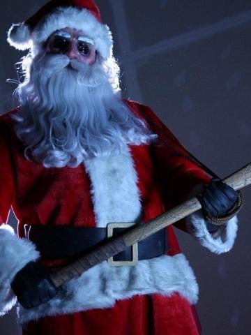 papai noel segura um machado. #paratodosverem 