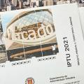 arte de carnê de iptu de 2021 com imagem da orla de Santos ao fundo. #paratodosverem