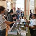 imagem mostra venda de livros #paratodosverem