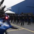 agentes da guarda perfilados ao fundo e moto em primeiro plano. #paratodosverem