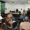 Reunião de lançamento de concurso. Várias pessoas estão sentadas em um auditório. #paratodosverem
