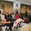pessoas reunidas em sala. #paratodosverem