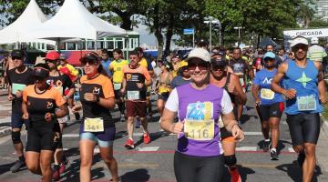atletas correndo em rua. #paratodosverem 