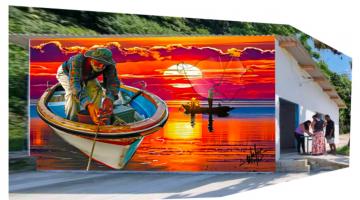 mural mostra um pescador num barco com por do sol ao fundo. O mural decora muro de prédio público. #paratodosverem