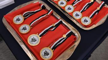 medalhas para homenageados em valise #paratodosverem