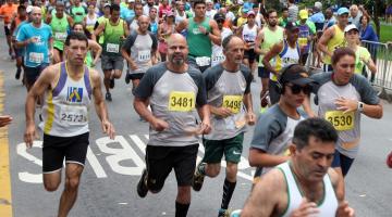 atletas correndo em via #paratodosverem