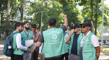agentes concentrados antes de mutirão #paratodosverem