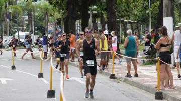atletas correndo na avenida da orla #paratodosverem 