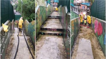 Passarela de pedestres sobre túnel recebe limpeza em Santos