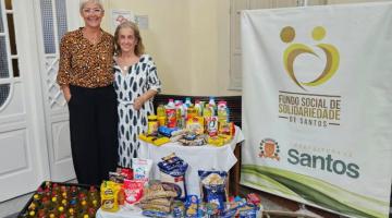Fundo Social de Santos recebe alimentos arrecadados em evento de moda 