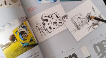 livro aberto com fotos das muretas. #paratodosverem 