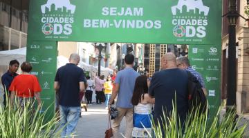 portal de entrada de evento ods com placa. #paratodosverem