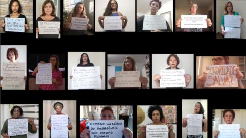 Trecho do vídeo tem várias mulheres com cartazes #paratodosverem 