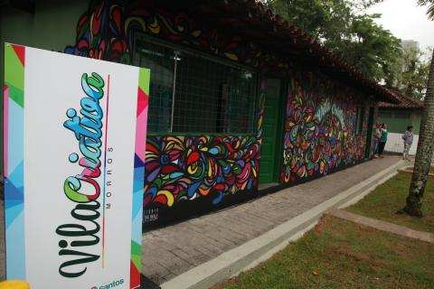 Fachada da Vila Criativa grafitada pelo artista #paratodosverem