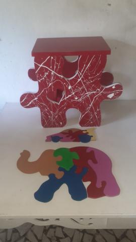 dois objetos artísticos. Um é abstrato e outro se assemelha a um elefante. #paratodosverem
