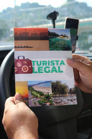 folheto orienta sobre a lei que regulamenta o turismo de um dia 