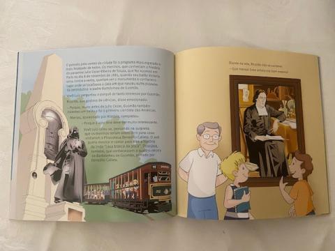 Página do livro aberta, com imagem do bonde e José Bonifácio. #Paratodosverem