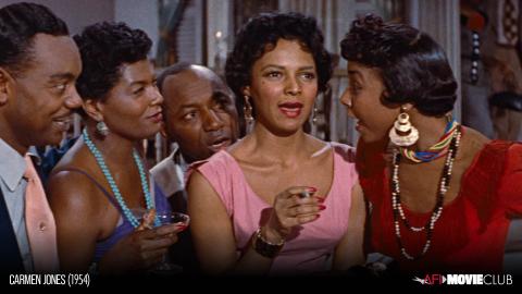 três mulheres em cena de carmen jones #paratodosverem
